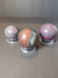 Ruby Kyanite Spheres & Palmstones
