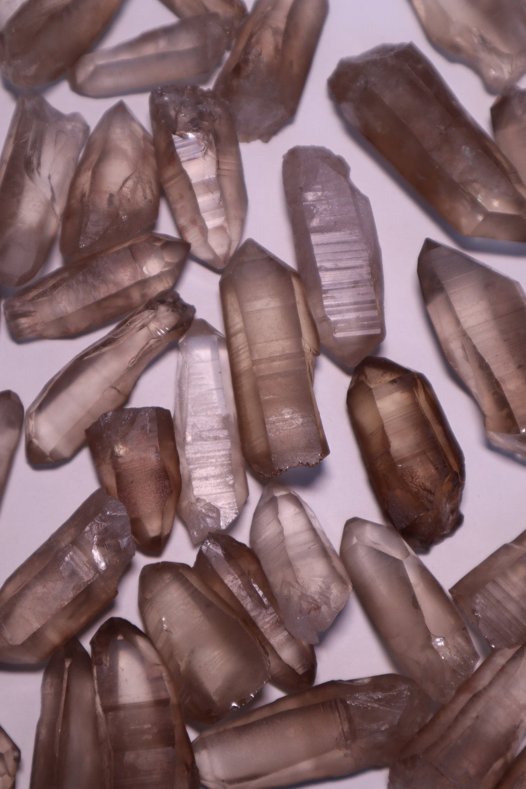 Smokey lemurian quartz crystal raw seed point — additional product photo